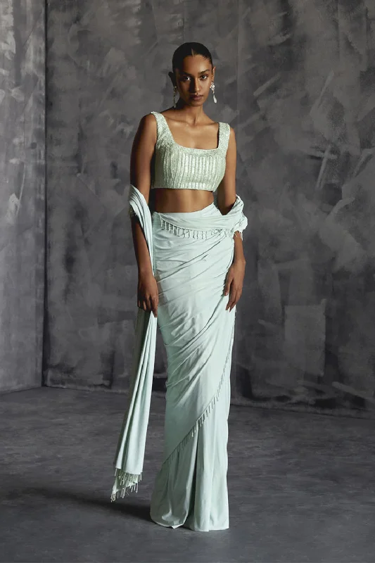 Fitted Draped Saree With Sleeveless Blouse Soft Pastel Blouse