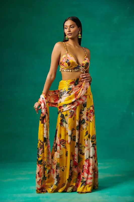 Surajmukhi' Yellow Floral Print Blouse With Flared Sharara And Drape Attached To It Casual Button Blouse Surajmukhi' Yellow Floral Print Blouse With Flared Sharara And Drape Attached To It Casual Button Blouse